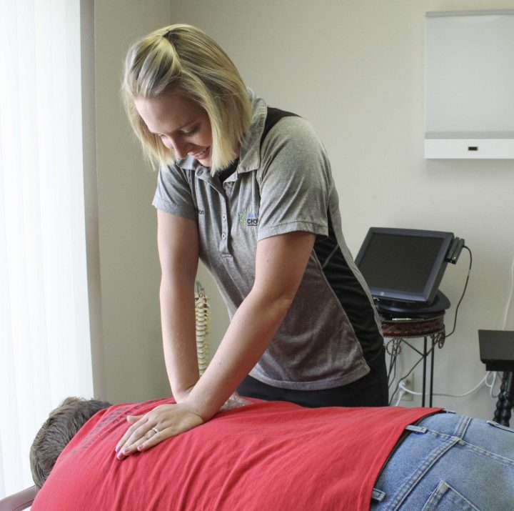Dr. Acton doing a back adjustment